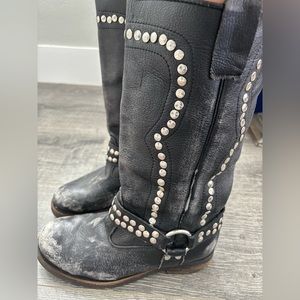 Stylish intentionally distressed motorcycle boot